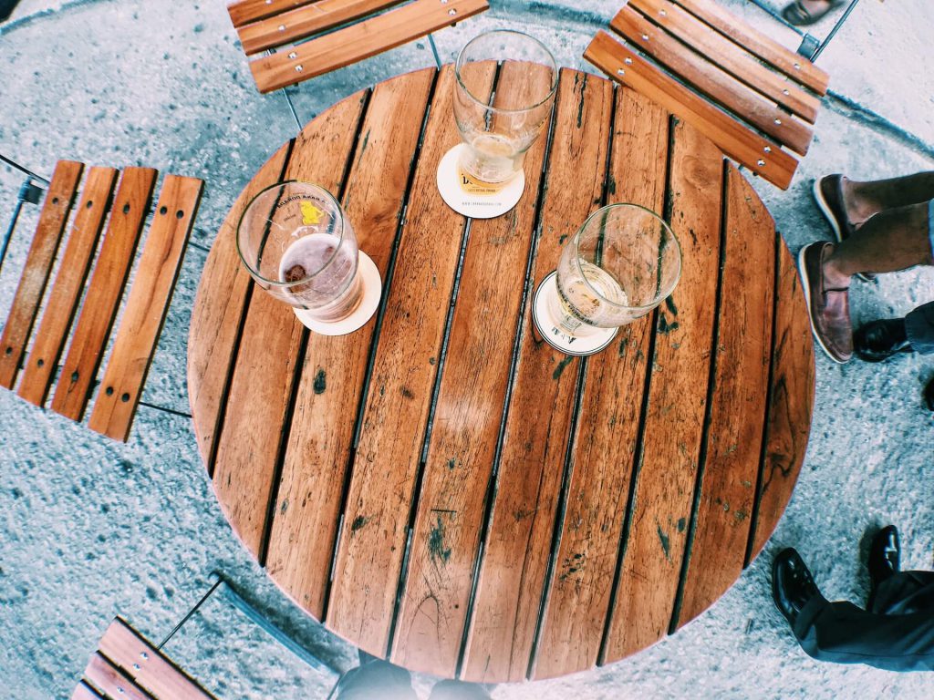 Table with drinks at a work summer party at a rooftop bar